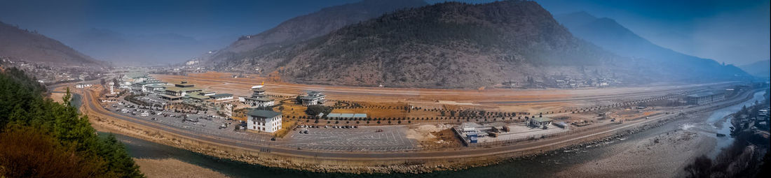 Panoramic view of road amidst mountains against sky