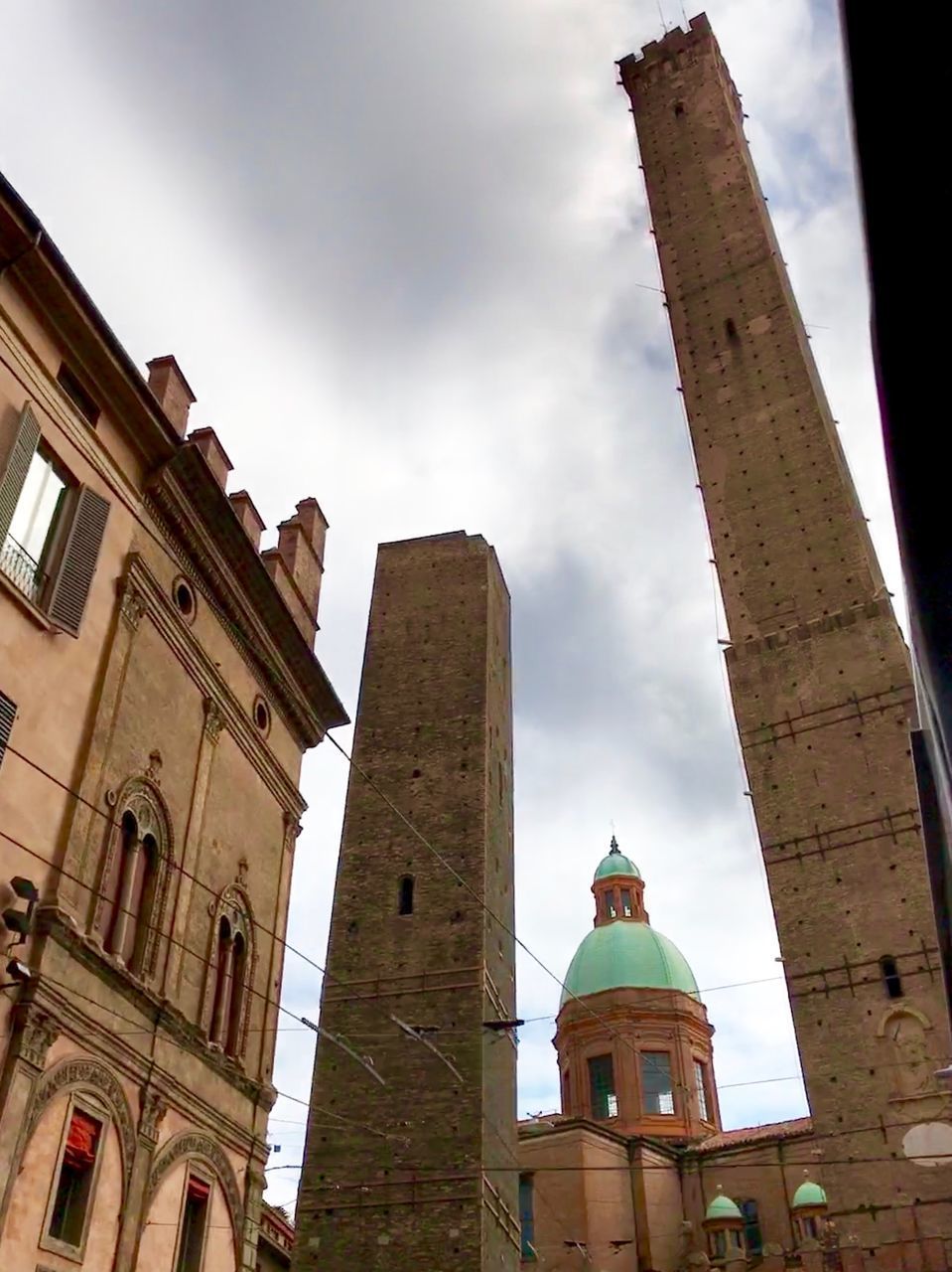 LOW ANGLE VIEW OF A CLOCK TOWER