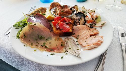 High angle view of italian seafood served in plate on table