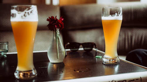 Close-up of beer glass on table