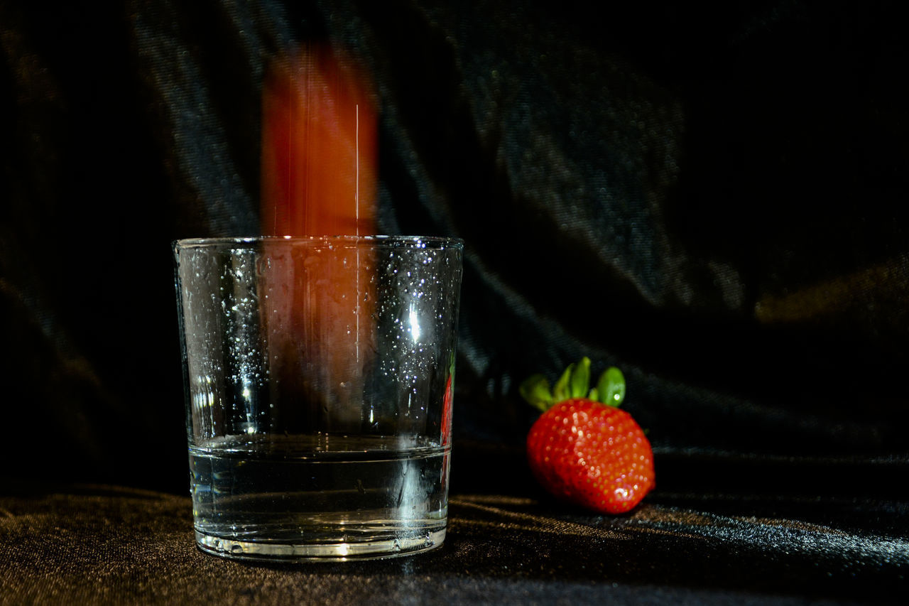 CLOSE-UP OF DRINK IN GLASS