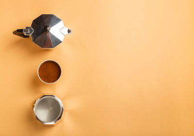 High angle view of coffee cup on table