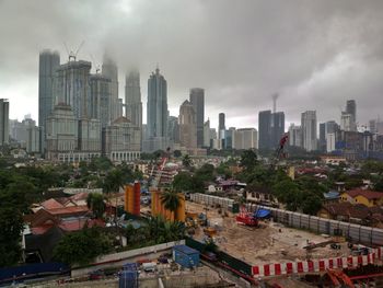 Modern buildings in city against sky