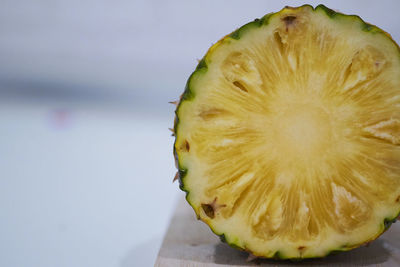 Close-up of lemon slice on table