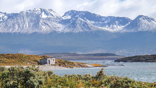 Scenic view of snowcapped mountains against sky