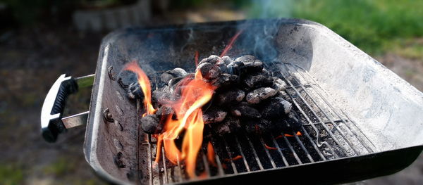 Close-up of bonfire on barbecue grill