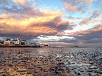 Scenic view of sea against cloudy sky