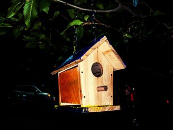 Close-up of birdhouse on tree