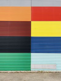 Multi colored shutter on wall