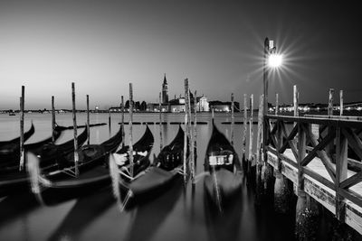 View of boats moored in canal