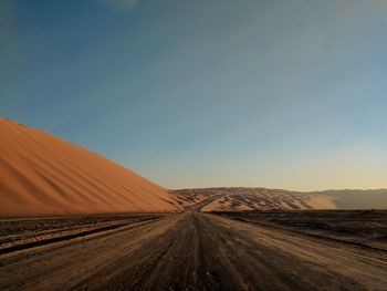 Scenic view of desert against sky