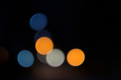 Defocused lights against black background