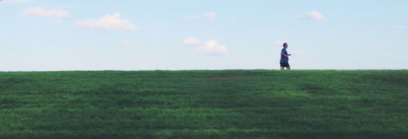 Man standing on grassy field