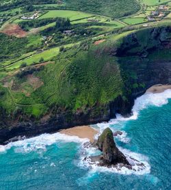 High angle view of rocks by sea