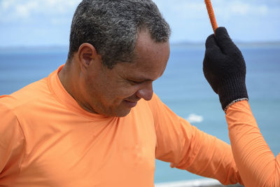 Man preparing to practice rappel on elevador lacerda, the postcard of salvador, bahia, brazil.