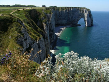 Cliff by sea at etretat