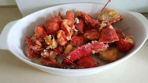 High angle view of strawberries in plate on table