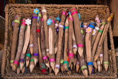 Close-up of multi colored sticks in basket