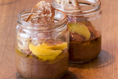 Close-up of drink in glass jar on table