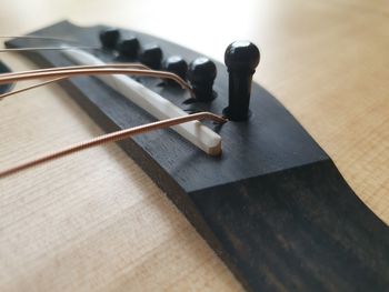 High angle view of black and book on table