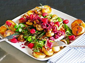 High angle view of fruits in plate on table