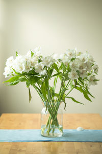 Close-up of flowers on table