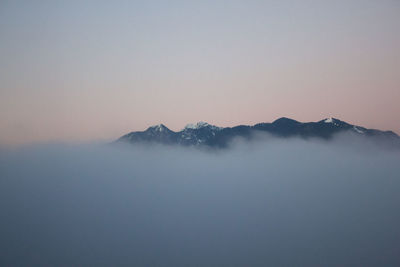 Scenic view of mountains against sky during sunset