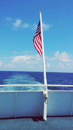 American flag against blue sky