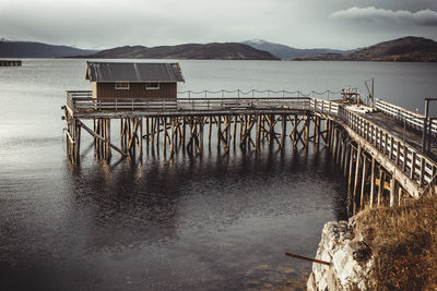 House on wooden port in a norwegian fjord