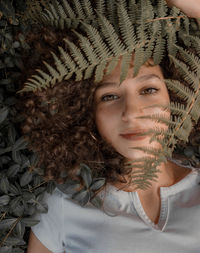 Portrait of young woman wearing hat