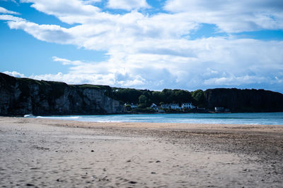 Scenic view of beach against sky