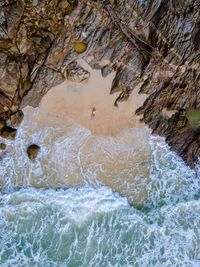 Scenic view of rocks in sea