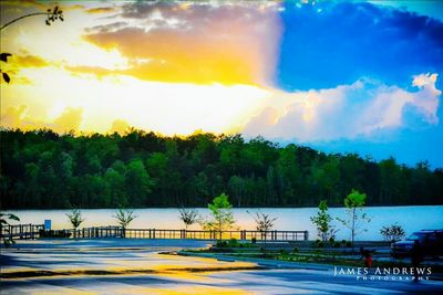 Scenic view of landscape against sky at sunset