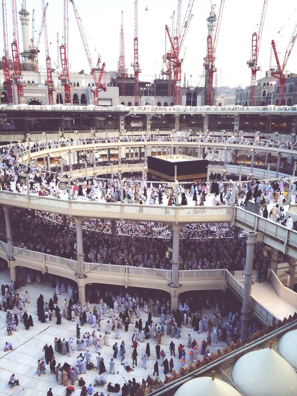 large group of people, crowd, person, men, mixed age range, lifestyles, built structure, architecture, market, leisure activity, crowded, abundance, city life, city, building exterior, day, tourism, travel, market stall