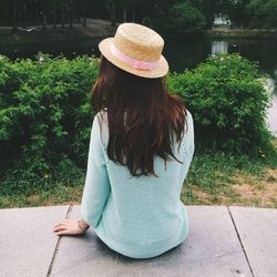 Rear view of woman wearing hat