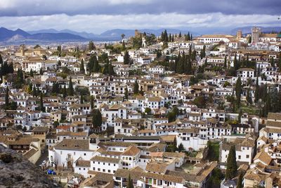 High angle view of townscape granada  against sky