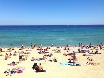 People enjoying at beach