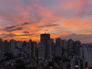 Cityscape against sky during sunset