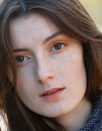 Close-up portrait of beautiful young woman