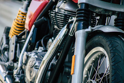 Close-up of bicycle parked in row