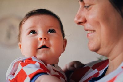 Portrait of cute boy with baby