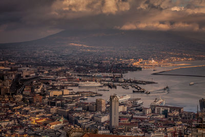 High angle view of city buildings during sunset