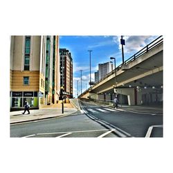 Empty walkway in city