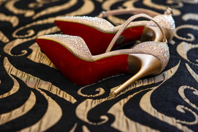 Close-up of high heels on floor