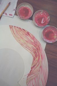 Close-up of red object on table