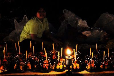 View of illuminated people at night