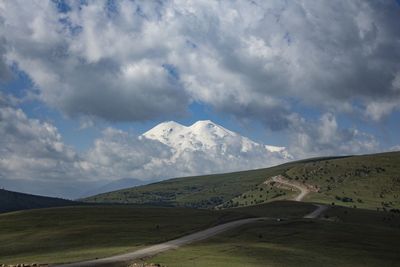 Scenic view of snowcapped mountains against sky