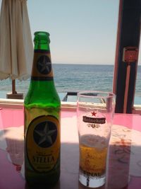 Close-up of beer bottles on table