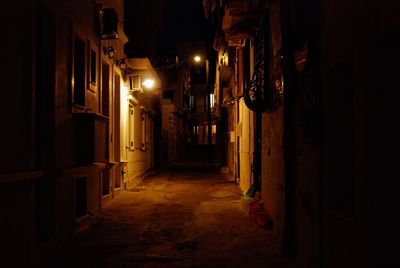 Illuminated street at night