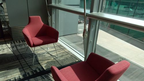 High angle view of empty chairs on table